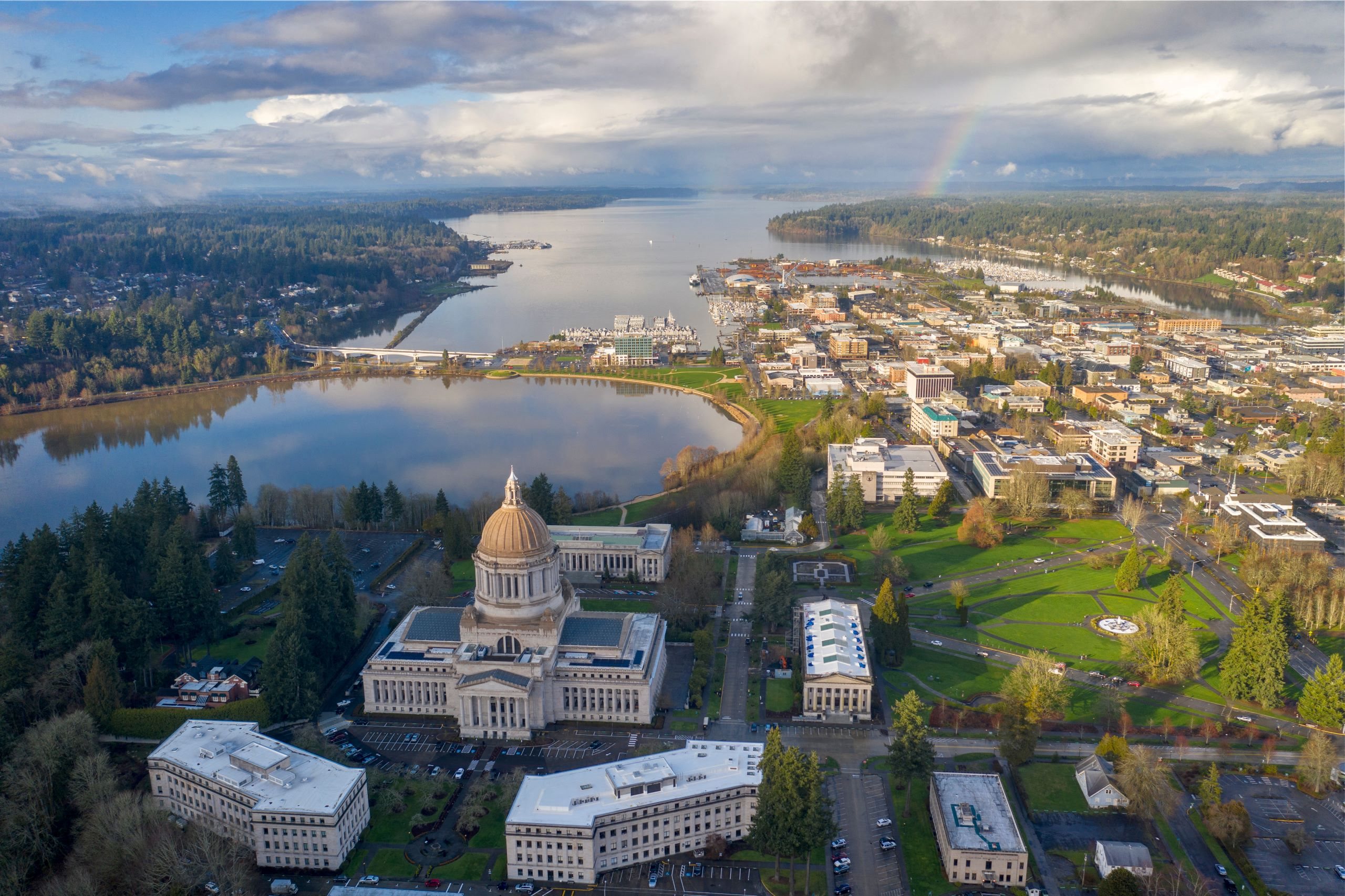 an aerial view of the river and the city